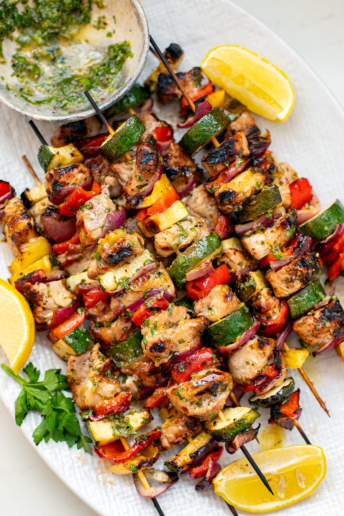 Pork skewers with zucchini, onion and bell peppers and Greek Marinade