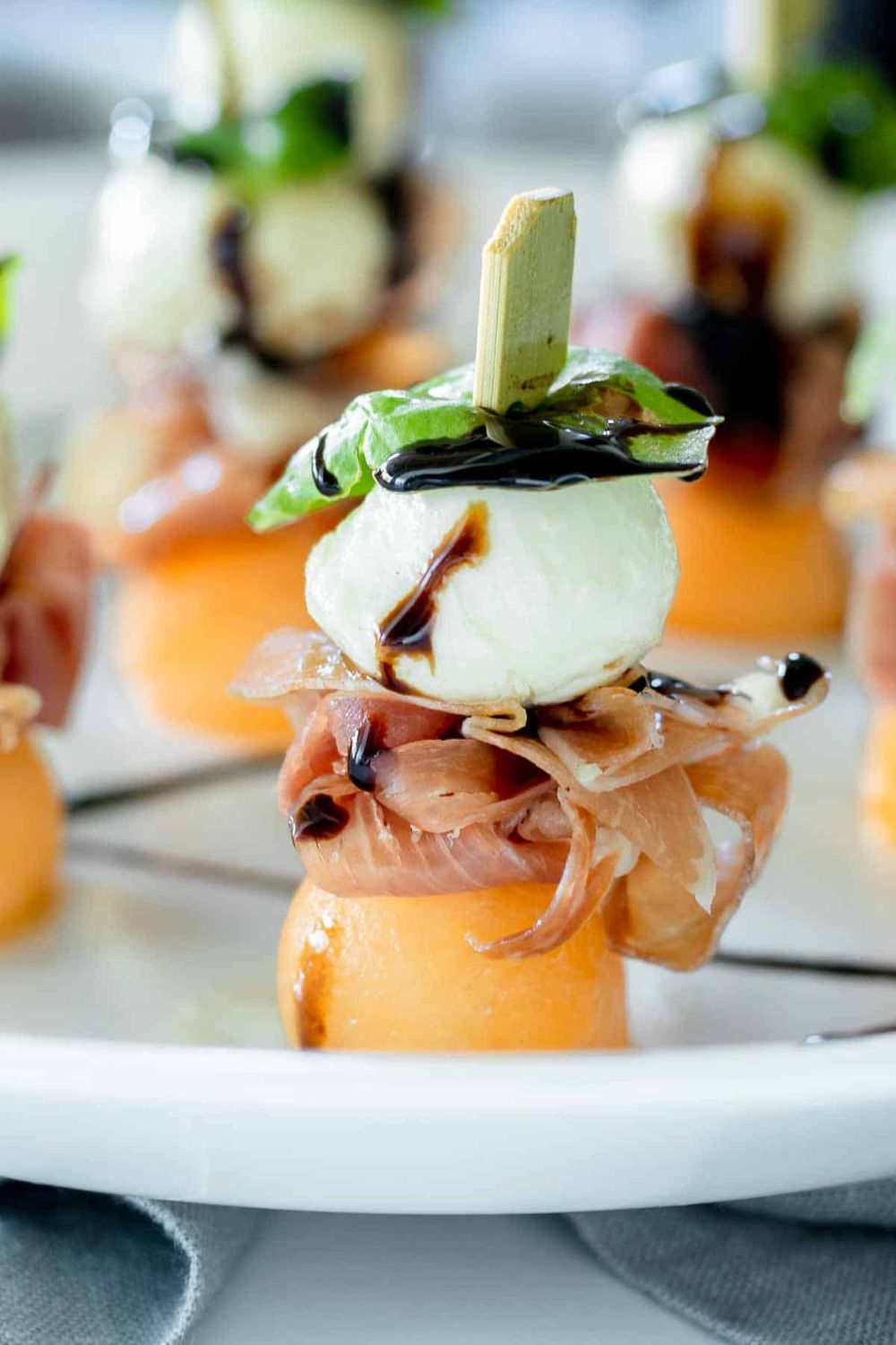 Prosciutto Melon Skewers And Mozzarella Skewers With Balsamic Glaze