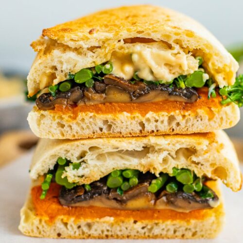 vegetarian mushroom broccolini sandwich halved and closed up